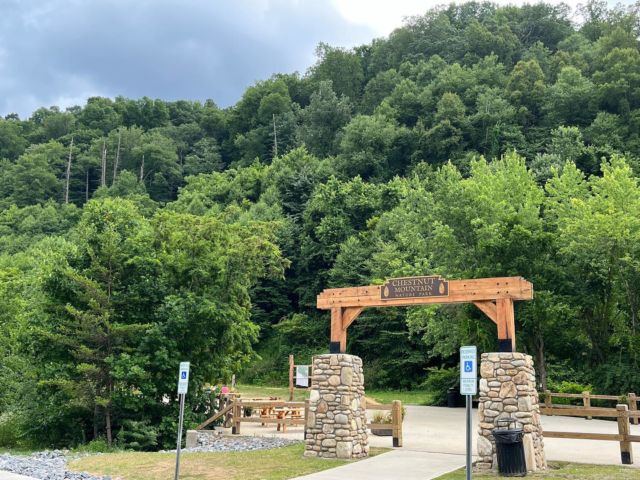 Have you explored the new @chestnutmountainpark yet? It is a beautiful 450 acre preserved tract of land, thanks to the conservation experts at Southern Appalachian Highlands Conservancy @appalachian_org, who have collaborated with @cantonnc.cares to transform this land into a top-notch outdoor recreation destination. Take a stroll this holiday weekend to discover Phase 1 of the hiking trail “Paper Town Express,” which leads to an incredibly designed mountain bike playground: Berm Park. Berm Park has trail designs for beginners to experts and everything in between. Enjoy the Great Outdoors! @equinox_environmental @elevatedtraildesign
